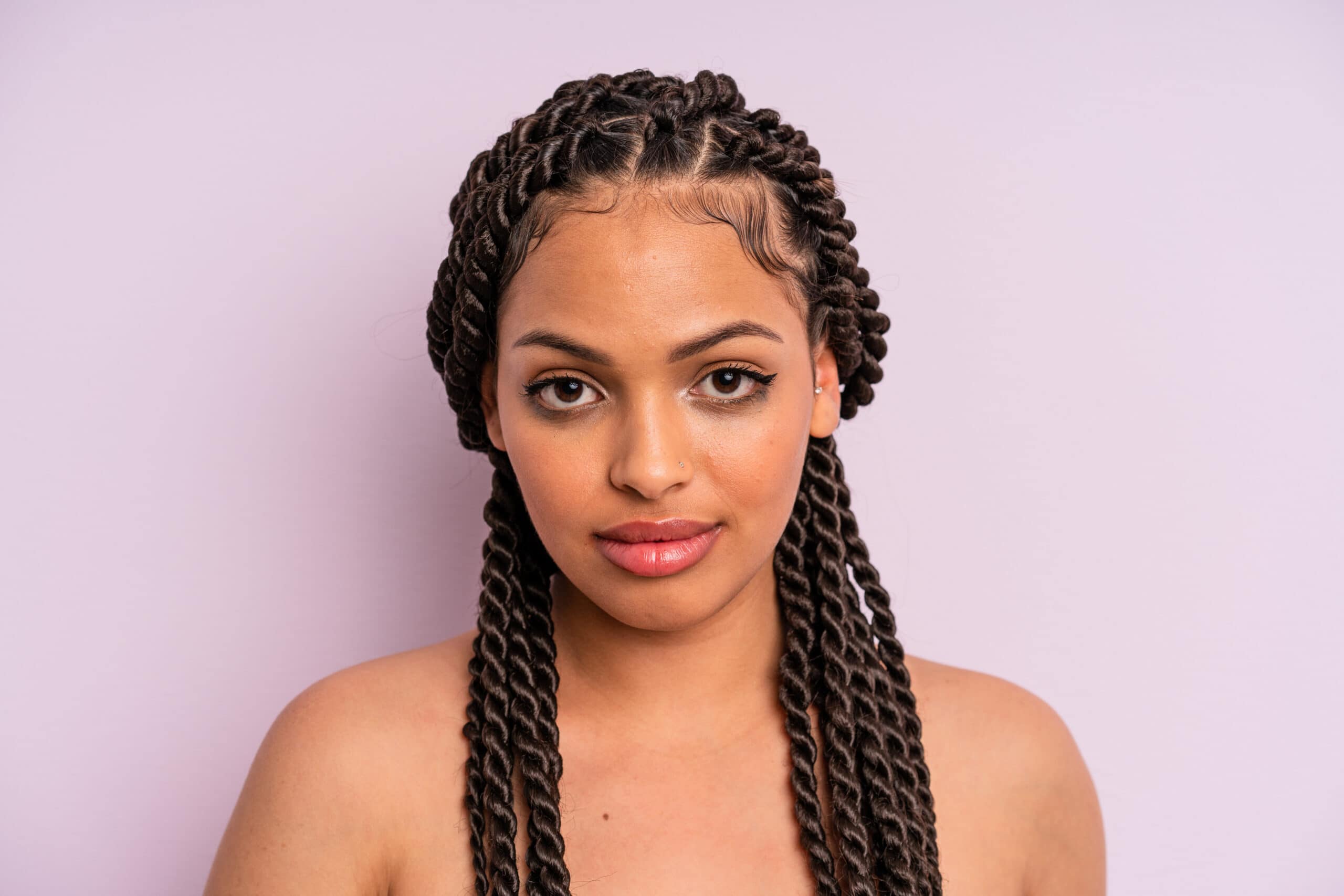 afro black woman with braids close up. beauty concept